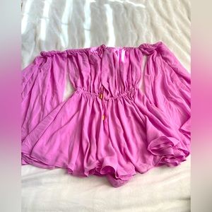 x REVOLVE Mishka Romper in Lilac
Michael Costello